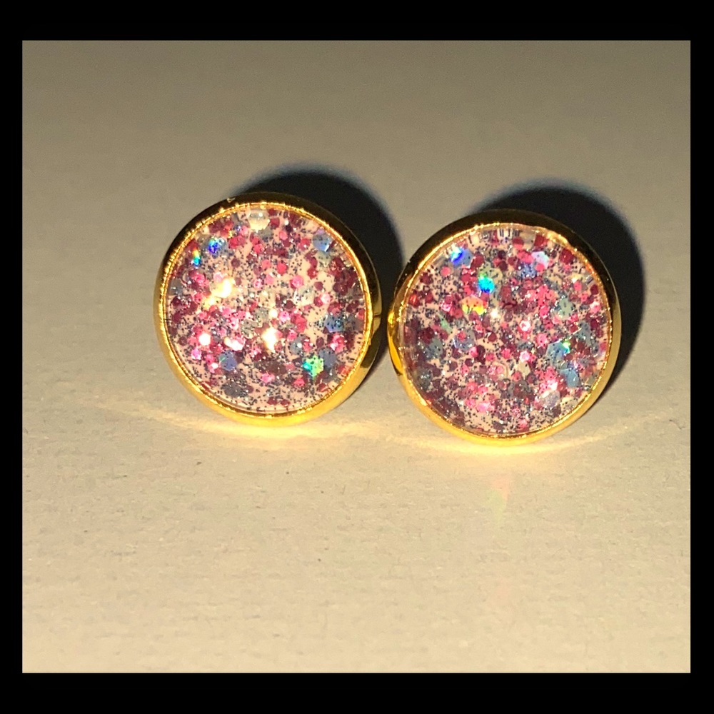 Handmade purple cabochon earrings.